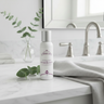 Ageless Lumina Peptide Toner with eucalyptus in vase
